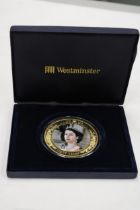 A BOXED 2013 CORONATION JUBILEE 65MM COIN WITH CERTIFICATE OF AUTHENTICITY
