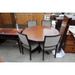 A RETRO HARDWOOD 49" DIAMETER EXTENDING DINING TABLE WITH TWO LEAVES (20" EACH) AND FOUR DINING