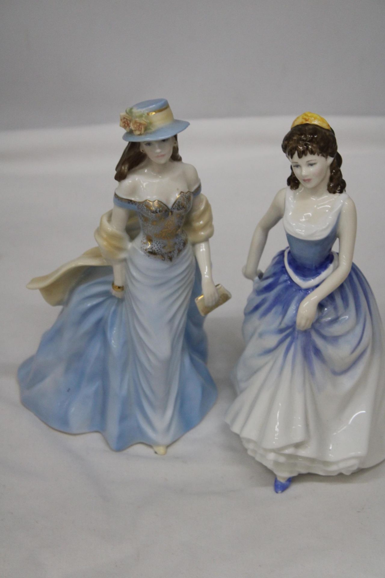 A ROYAL DOULTON FIGURE "MICHELLE" HN 4158 AND A ROYAL WOICESTER FIGURE "LOUISE"