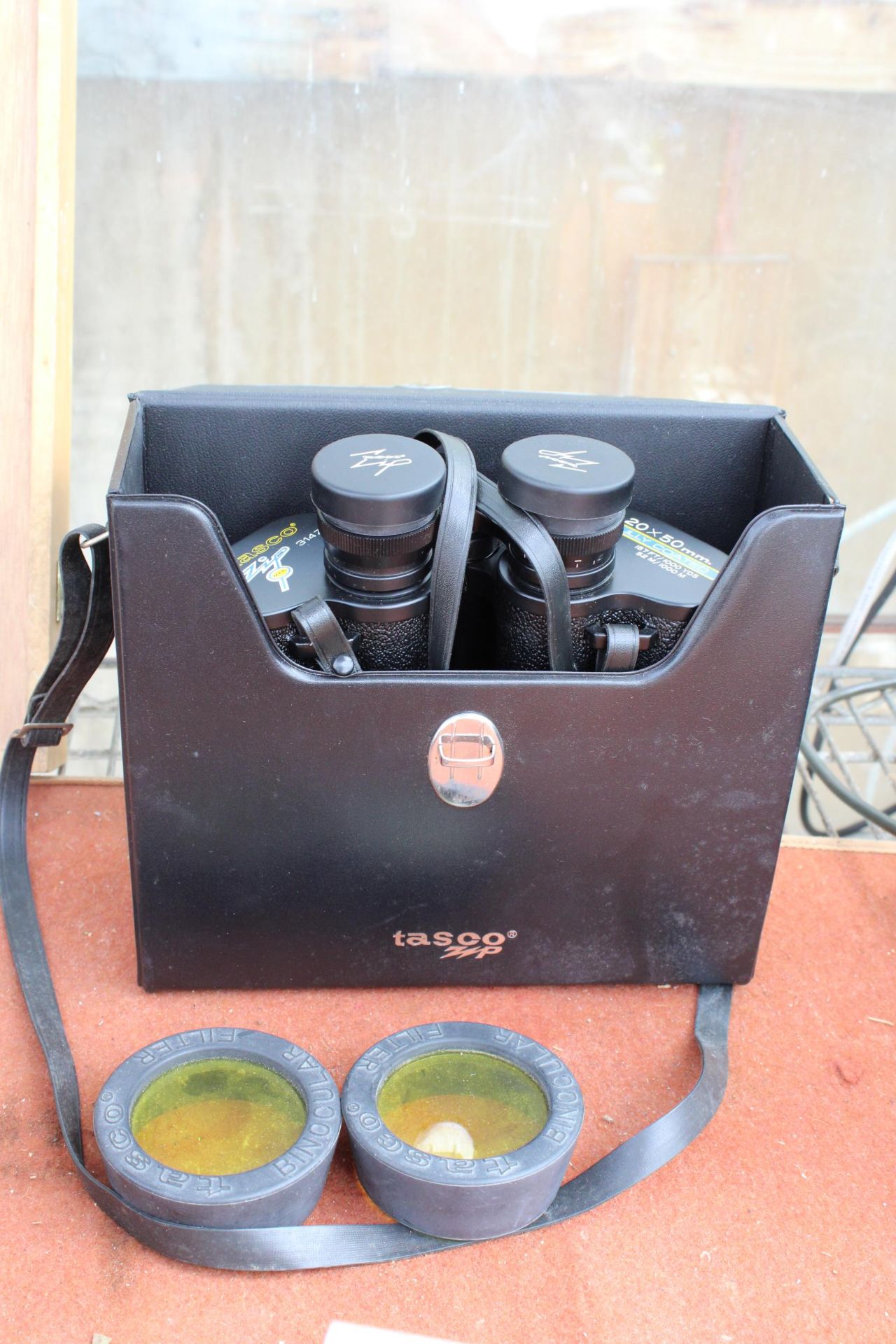 A PAIR OF CASED TASCO ZIP 314Z 20X50MM BINOCULARS