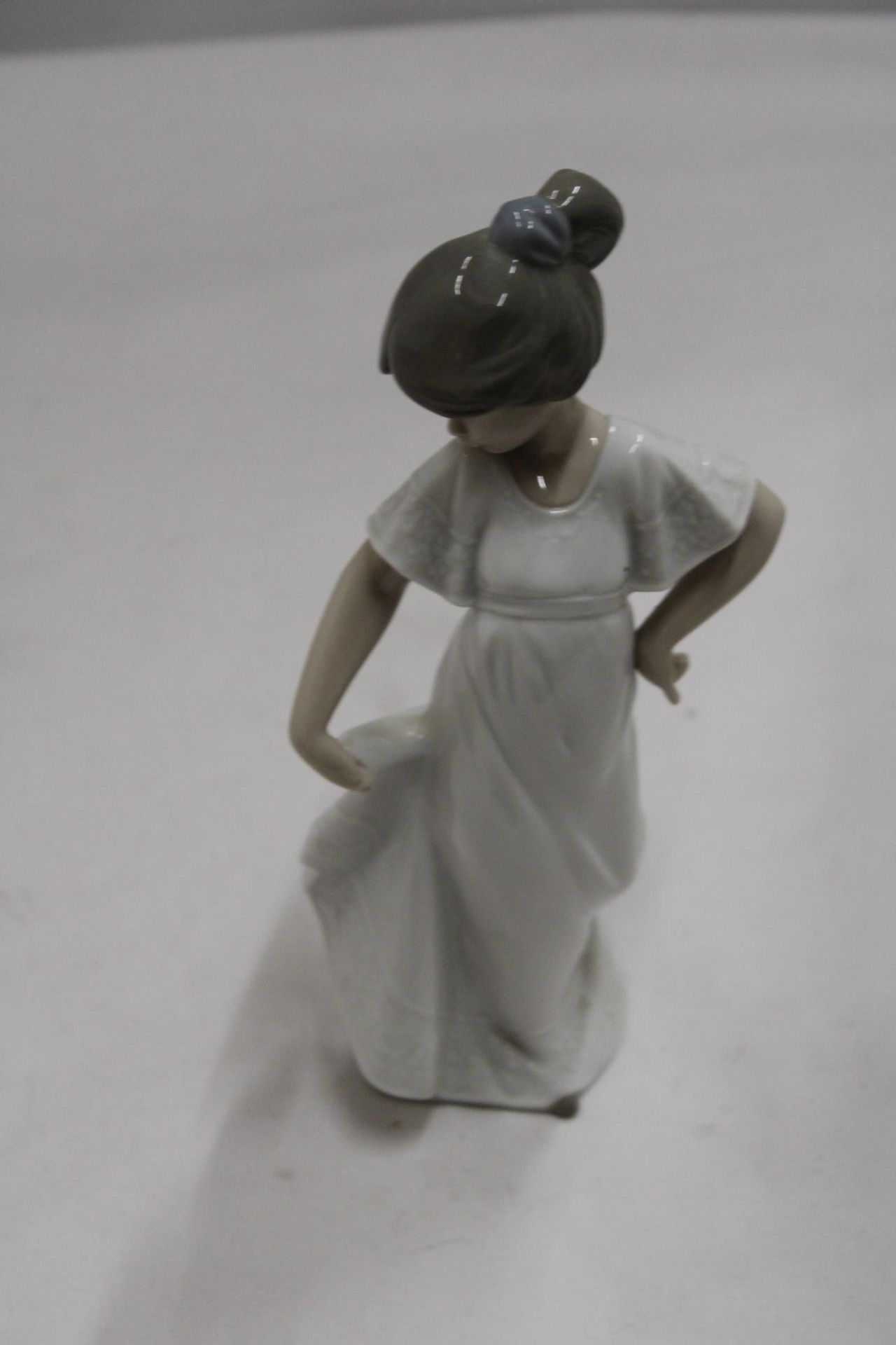 A NAO FIGURE OF A GIRL