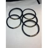 FIVE BANGLES POSSIBLY SILVER AND EBONY