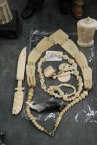 A COLLETION OF CARVED BONE ITEMS TO INCLUDE A SCENT BOTTLE, NECKLACES, ETC