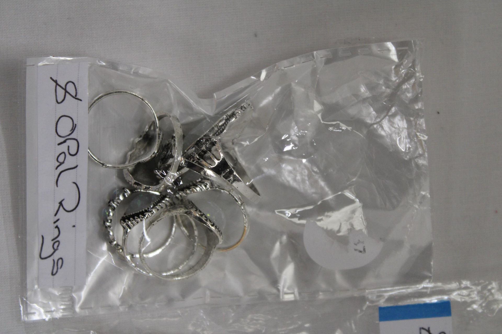 A QUANTITY OF COSTUME JEWELLERY TO INCLUDE OPAL AND TURQUOISE RINGS, PENDANTS AND CHAINS - Image 2 of 4