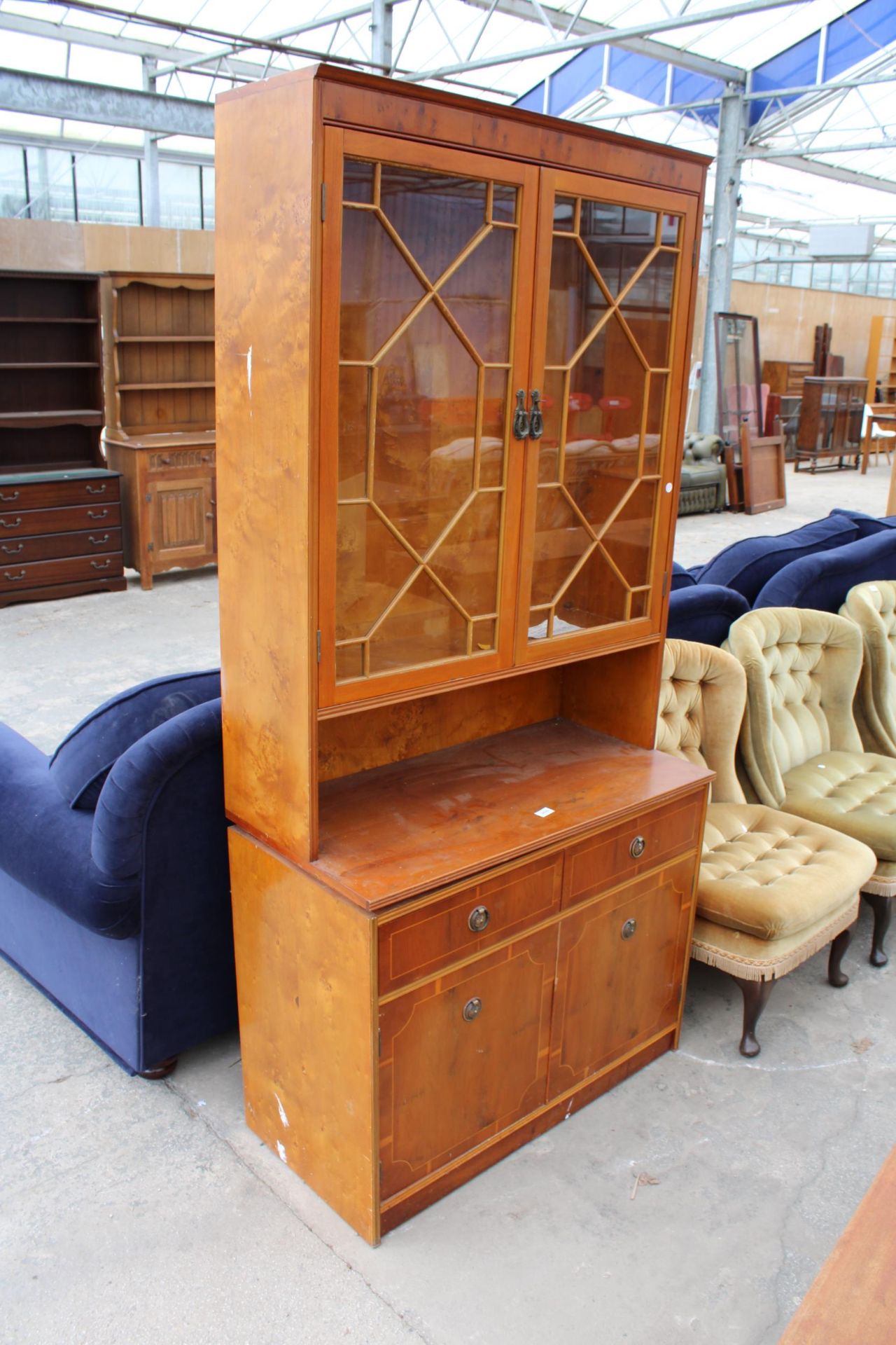 A BERESFORD AND HICKS LTD YEW WOOS TWO DOOR BOOKCASE ON BASE 36" WIDE