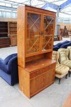 A BERESFORD AND HICKS LTD YEW WOOS TWO DOOR BOOKCASE ON BASE 36" WIDE