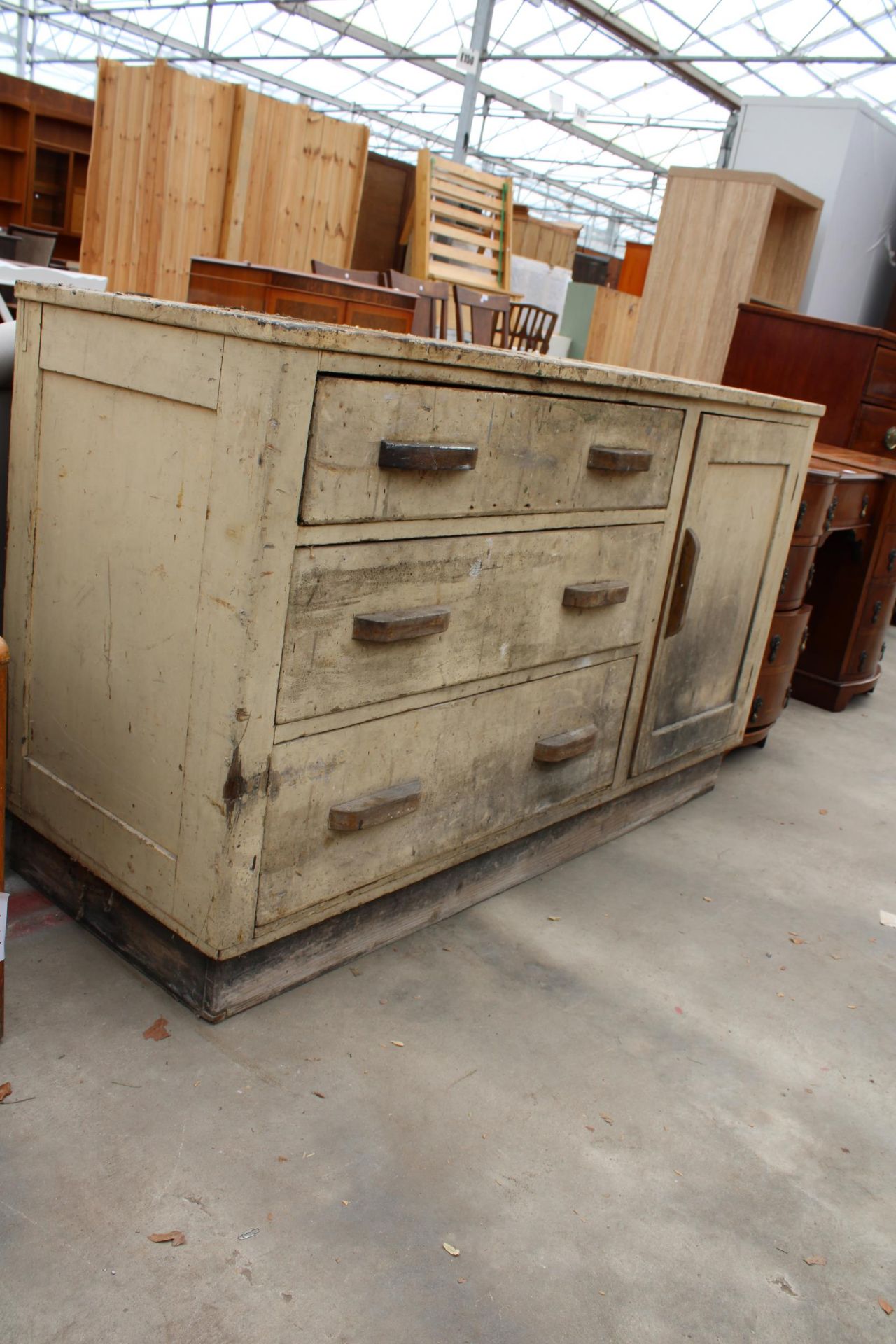 AN EARLY 20TH CENTURY BEECH BASE UNIT ENCLOSING THREE DRAWERS AND ONE CUPBOARD, 54.5" WIDE - Image 2 of 4