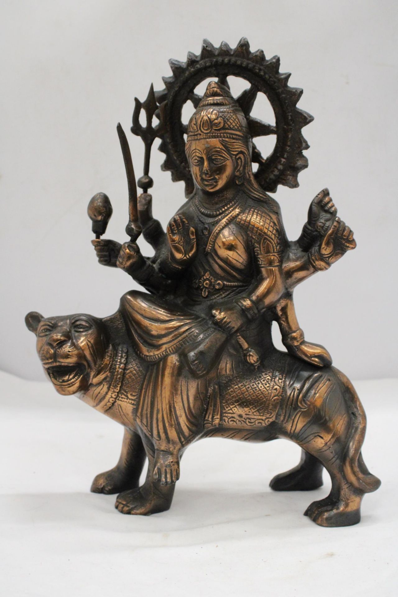 A BRONZE EXOTIC INDIAN MOTHER GODDESS ON A TIGER'S BACK, HEIGHT 38CM, LENGTH 28CM - Image 2 of 5