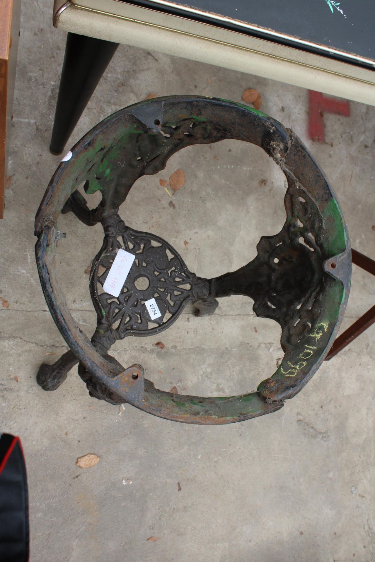 A CAST IRON PUB TABLE BASE WITH MASK AND FOLIATE DECORATION - Image 2 of 2