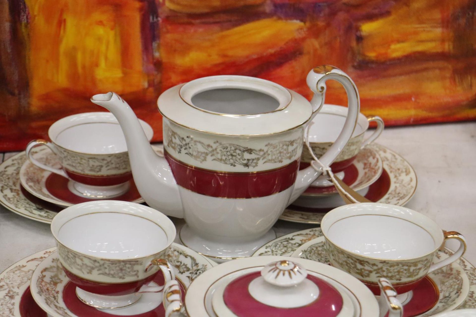 A 'TOKYO CHINA' TEASET TO INCLUDE A TEAPOT (NO LID), CREAM JUG, SUGAR BOWL, CUPS, SAUCERS AND SIDE - Image 2 of 4