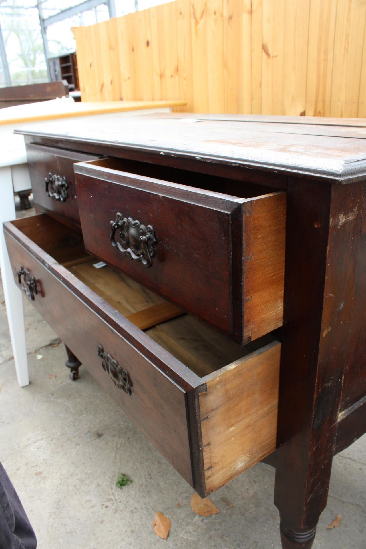 A LATE VICTORIAN CHEST OF TWO SHORT AND ONE LONG DRAWER, 42" WIDE - Image 3 of 4