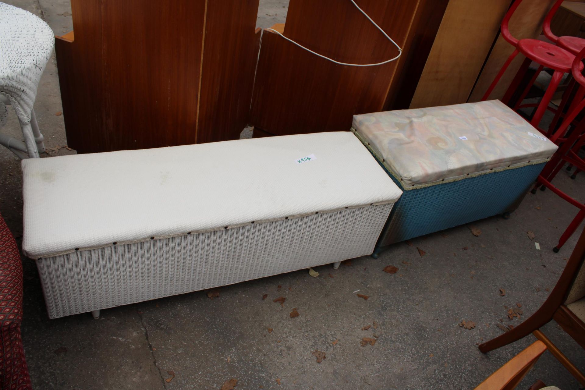 TWO LLOYD LOOM BLANKET CHESTS WITH UPHOLSTERED TOPS