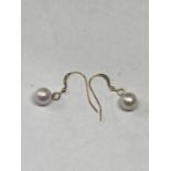 A PAIR OF MARKED 14K PEARL EARRINGS GROSS WEIGHT 1.36 GRAMS