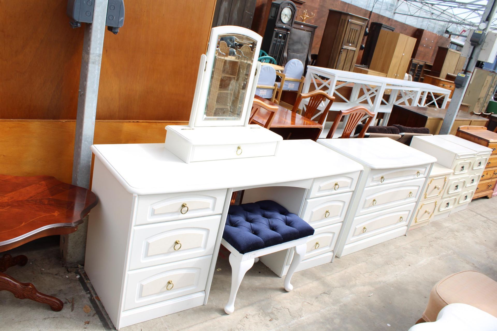 A MODERN WHITE DRESSING TABLE, STOOL AND CHEST OF THREE DRAWERS