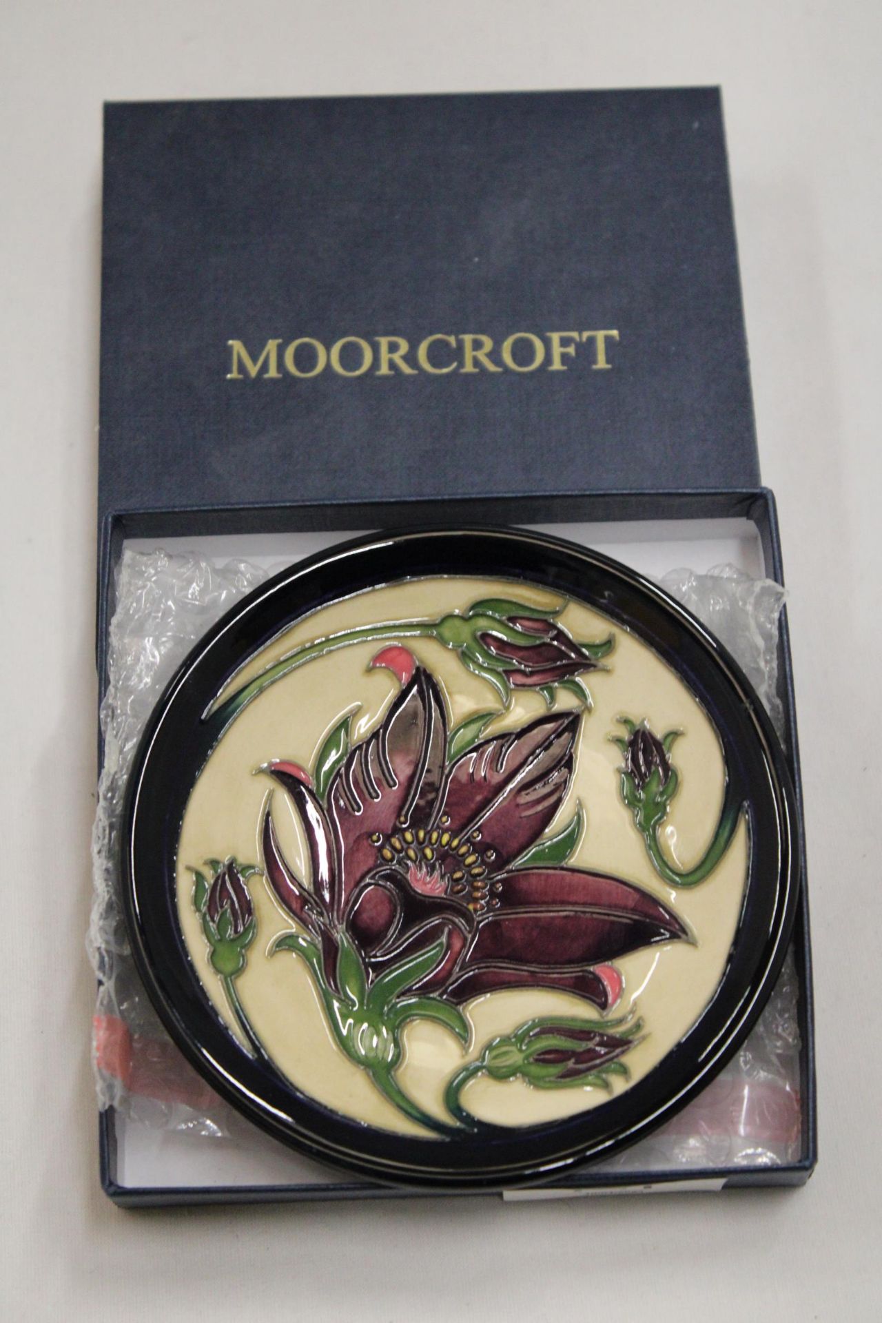 A BOXED MOORCROFT PULSATILLA & TIGRIS COASTER/PIN TRAY - 12 CM