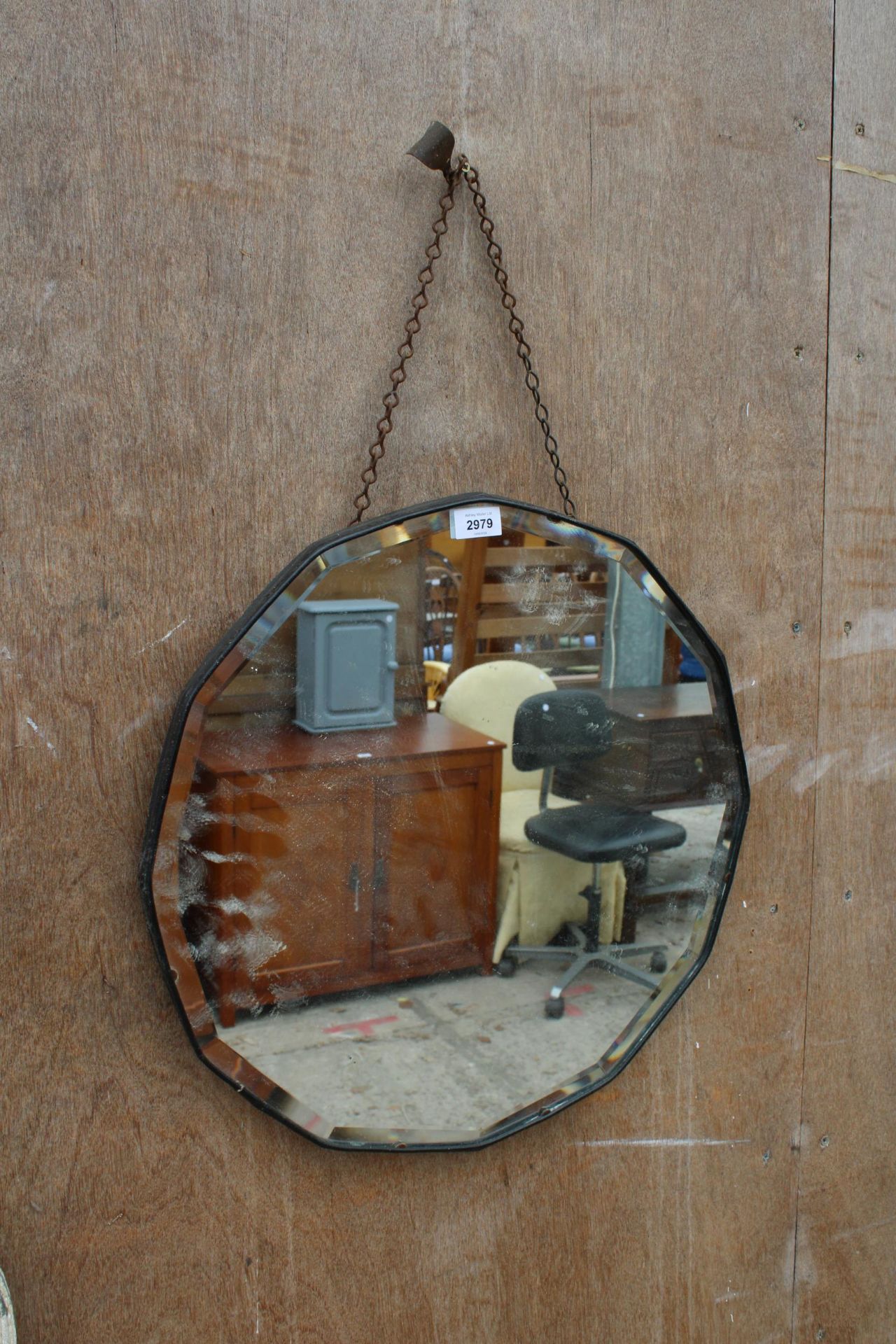 A DODECAGON SHAPED 20.5" DIAMATER WALL MIRROR