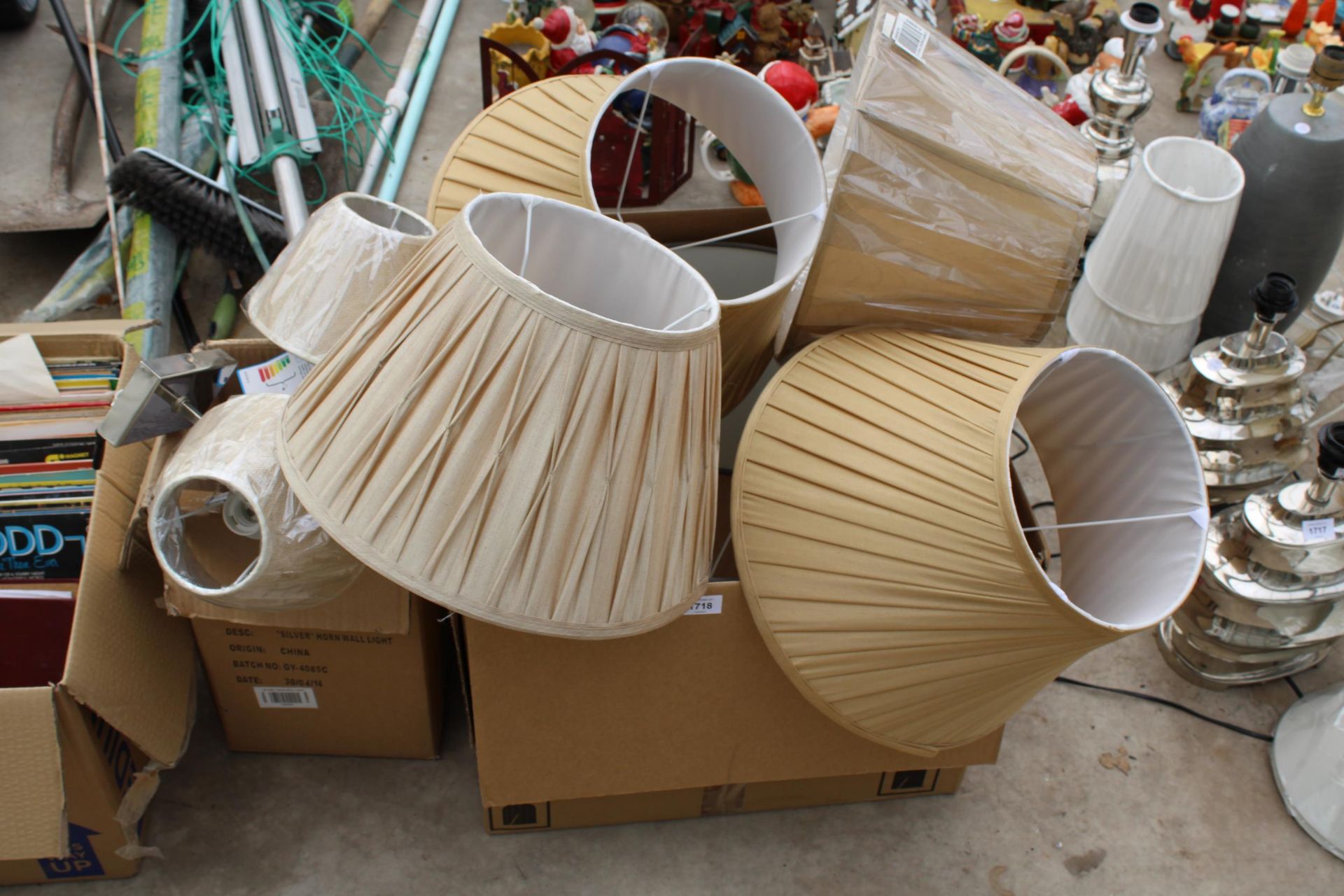 AN ASSORTMENT OF LIGHT FITTINGS AND LAMP SHADES ETC