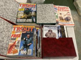 A LARGE COLLECTION OF FISHING MAGAZINES TO INCLUDE "TROUT FISHERMAN" AND "FLY FISHING AND FLY TYING"