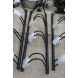 A METAL FOUR SECTION BIKE RACK