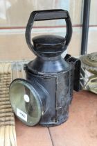 A VINTAGE PARAFIN RAILWAY LANTERN MARKED B.R.M