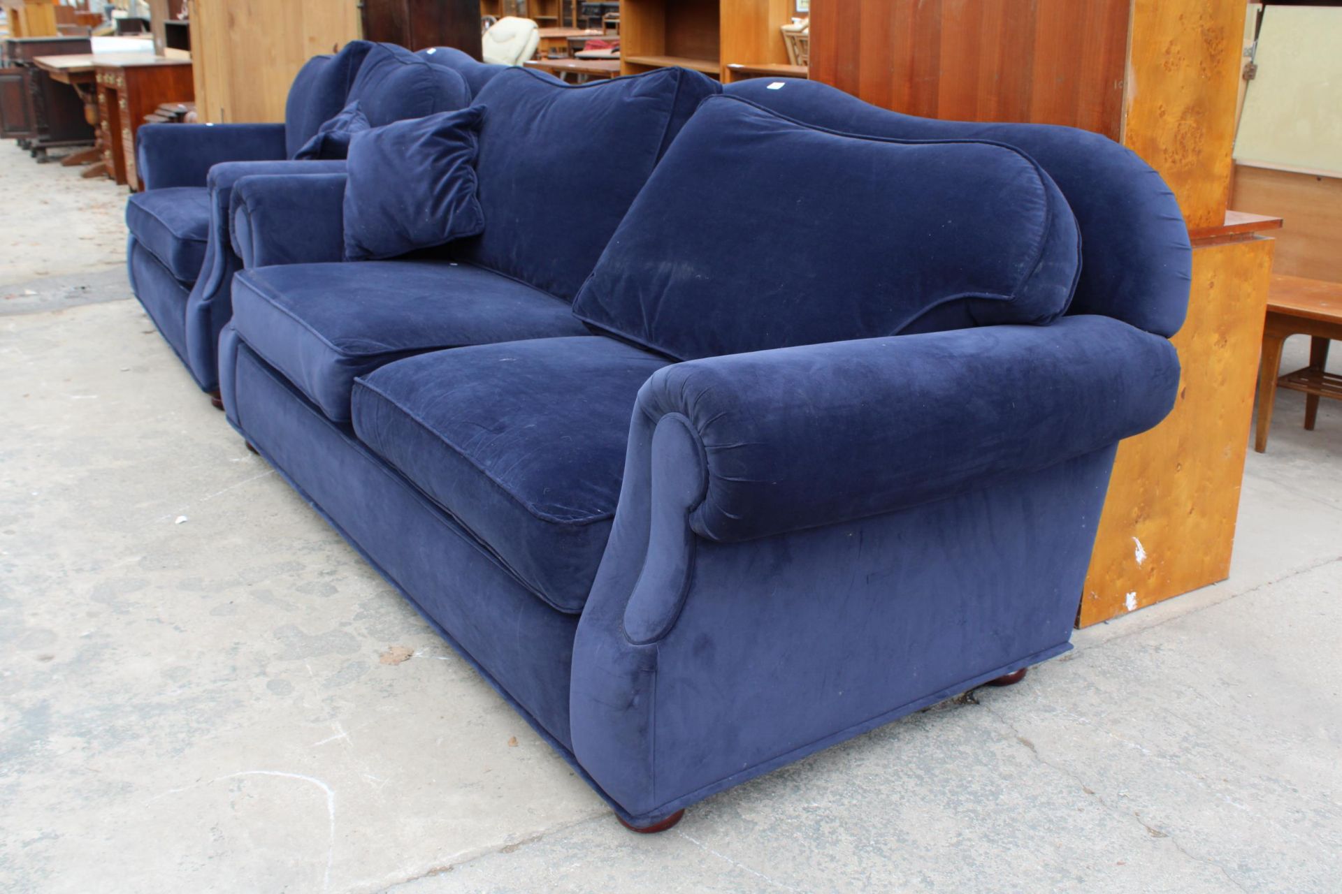 A MODERN BLUE THREE SEATER SETTEE WITH SPRUNG EDGE - Image 2 of 2