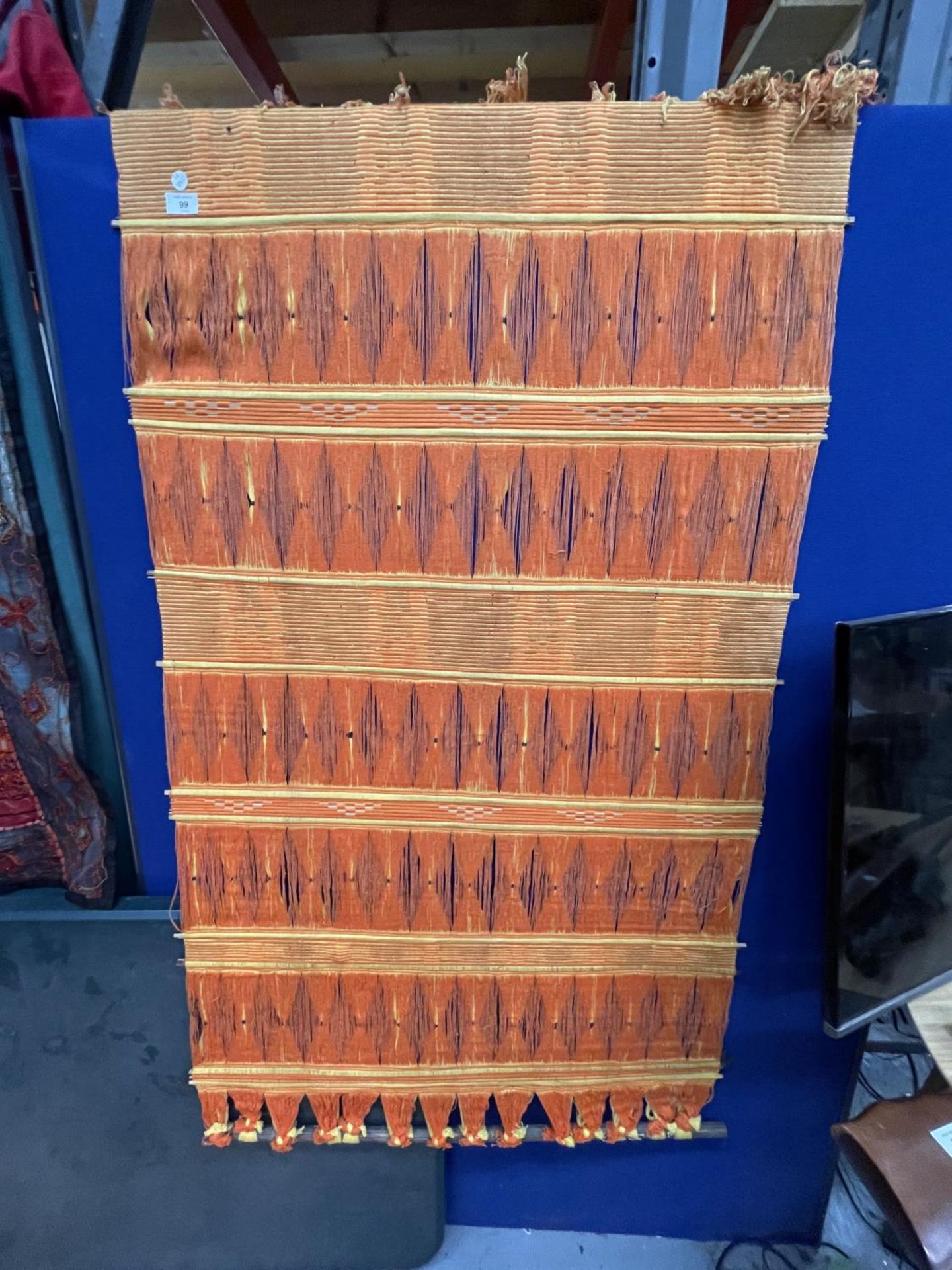 A VINTAGE ORANGE AND YELLOW WALL HANGING, 88CM X 170CM