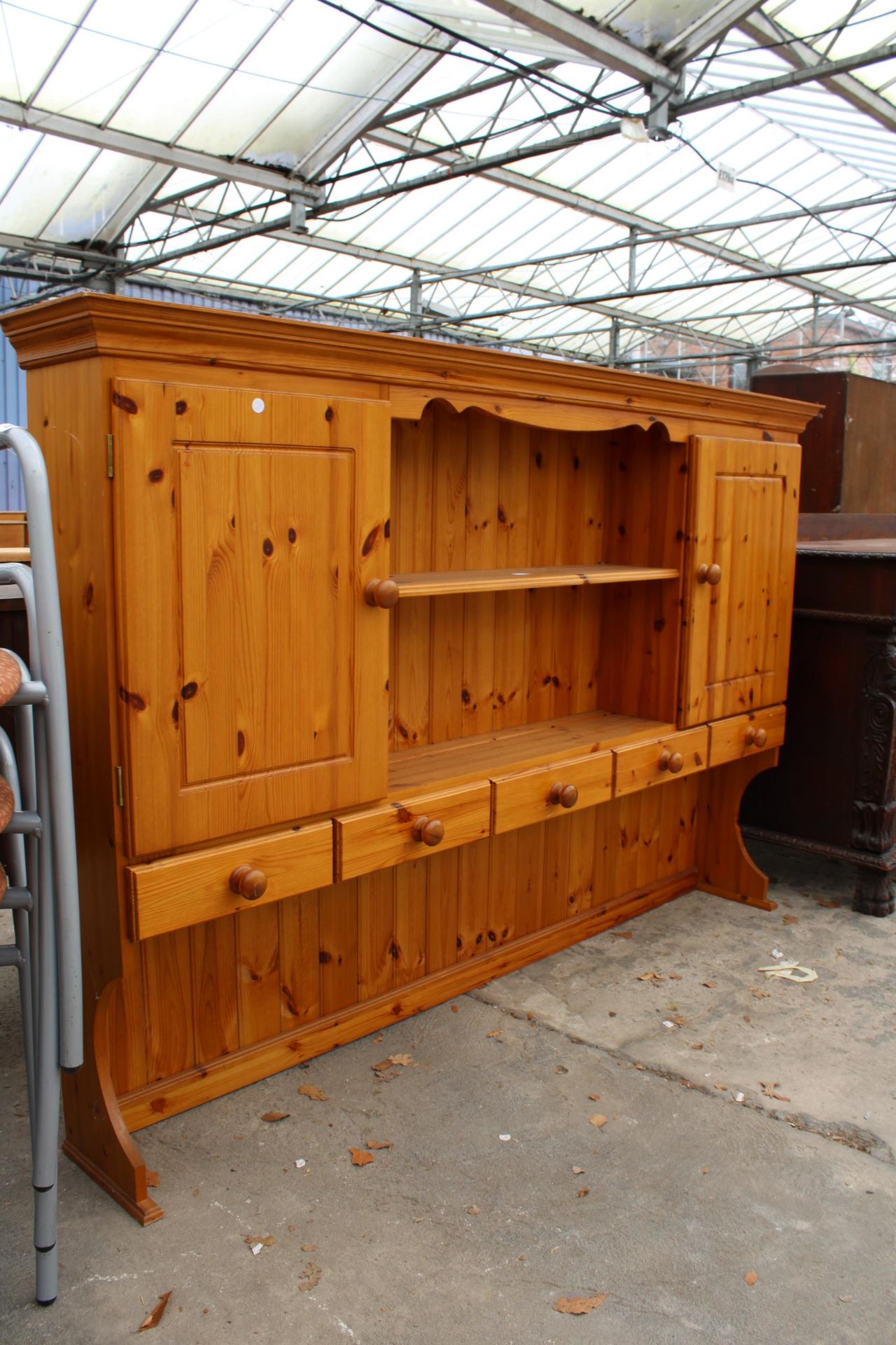 A PINE DRESSER RACK ENCLOSING CUPBARDS AND DRAWERS, 72" WIDE - Bild 2 aus 2