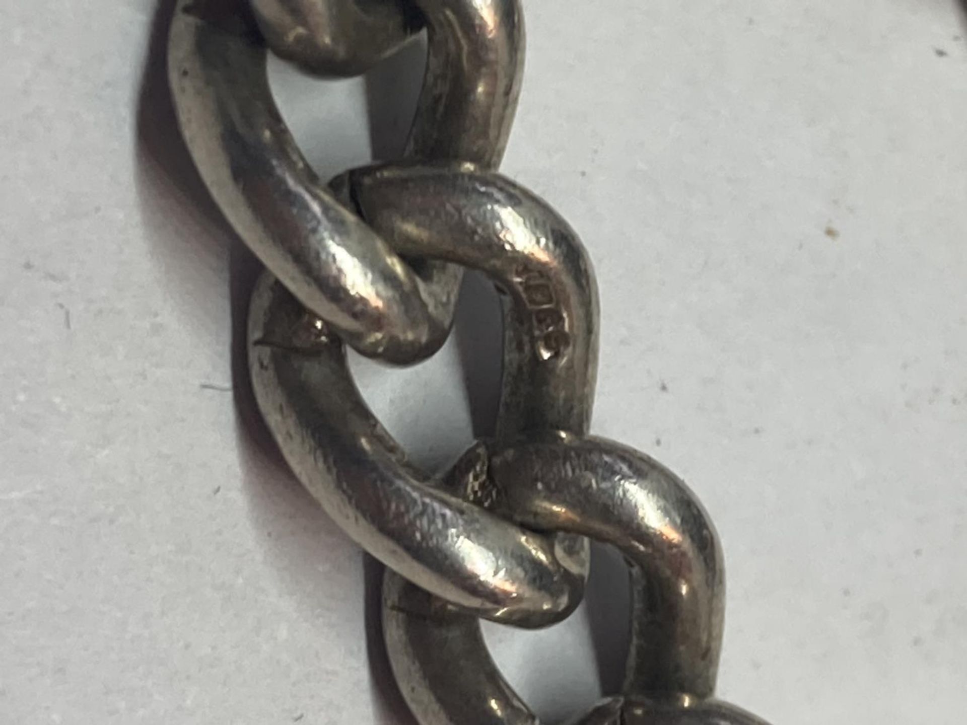 A MARKED SILVER WRIST CHAIN WITH SILVER HEART CLASP - Image 3 of 3