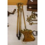 A LARGE BRASS COMPANION SET