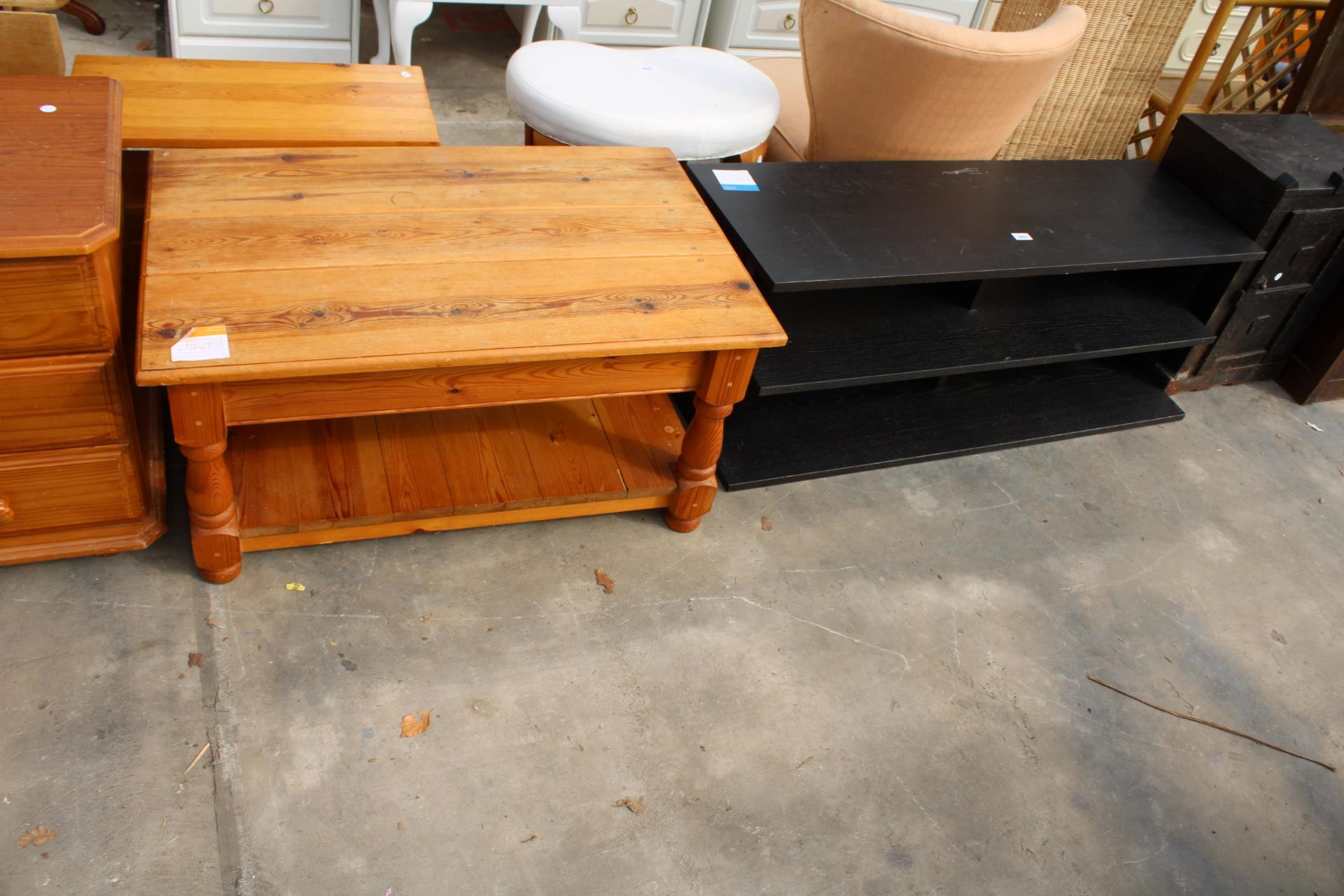 A MODERN PINE TWO TIER COFFEE TABLE AND BLACK ASH EFFECT THREE TIER TABLE