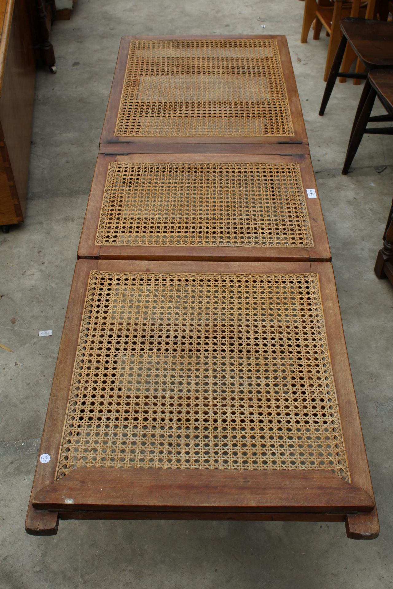 A LATE VICTORIAN HARDWOOD FOLDING DAY BED ON TURNED LEGS WITH SPLIT CANE SEATS/BACK - Image 5 of 7