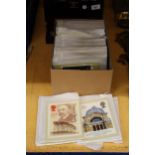 A COLLECTION OF ROYAL MAIL STAMP SERIES ON CARD