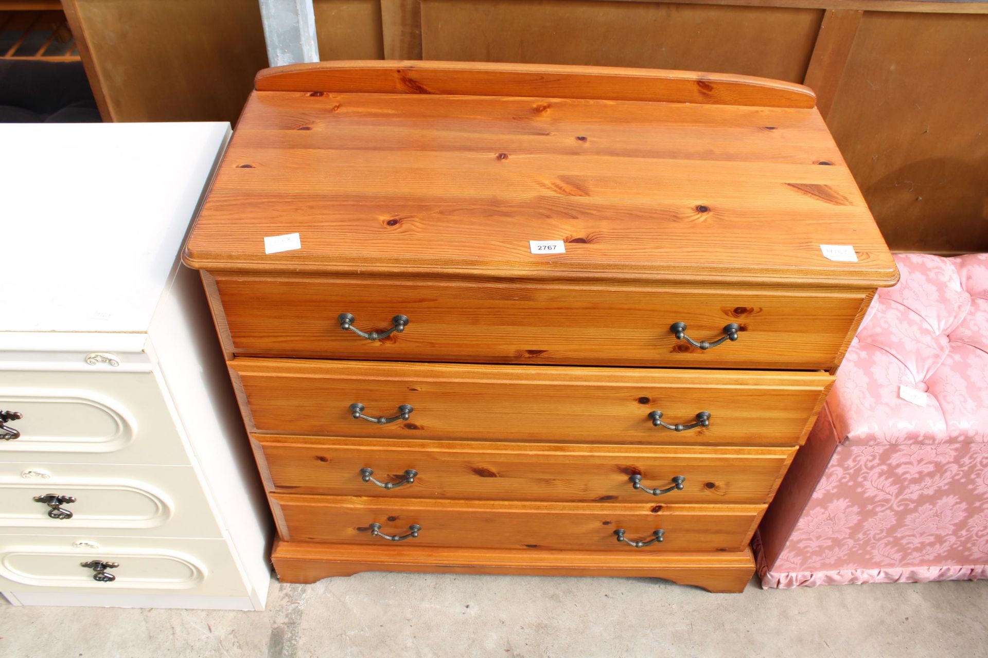 A MODERN PINE CHEST OF FOUR DRAWERS 33" WIDE