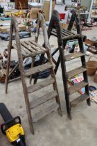 TWO VINTAGE WOODEN FOUR RUNG STEP LADDERS