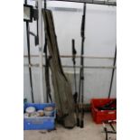 A ROD CARRYING BAG AND TWO VARIOUS FISHING RODS