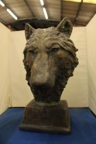 A LARGE BRONZED BUST OF A WOLF SIGNED TO THE BACK