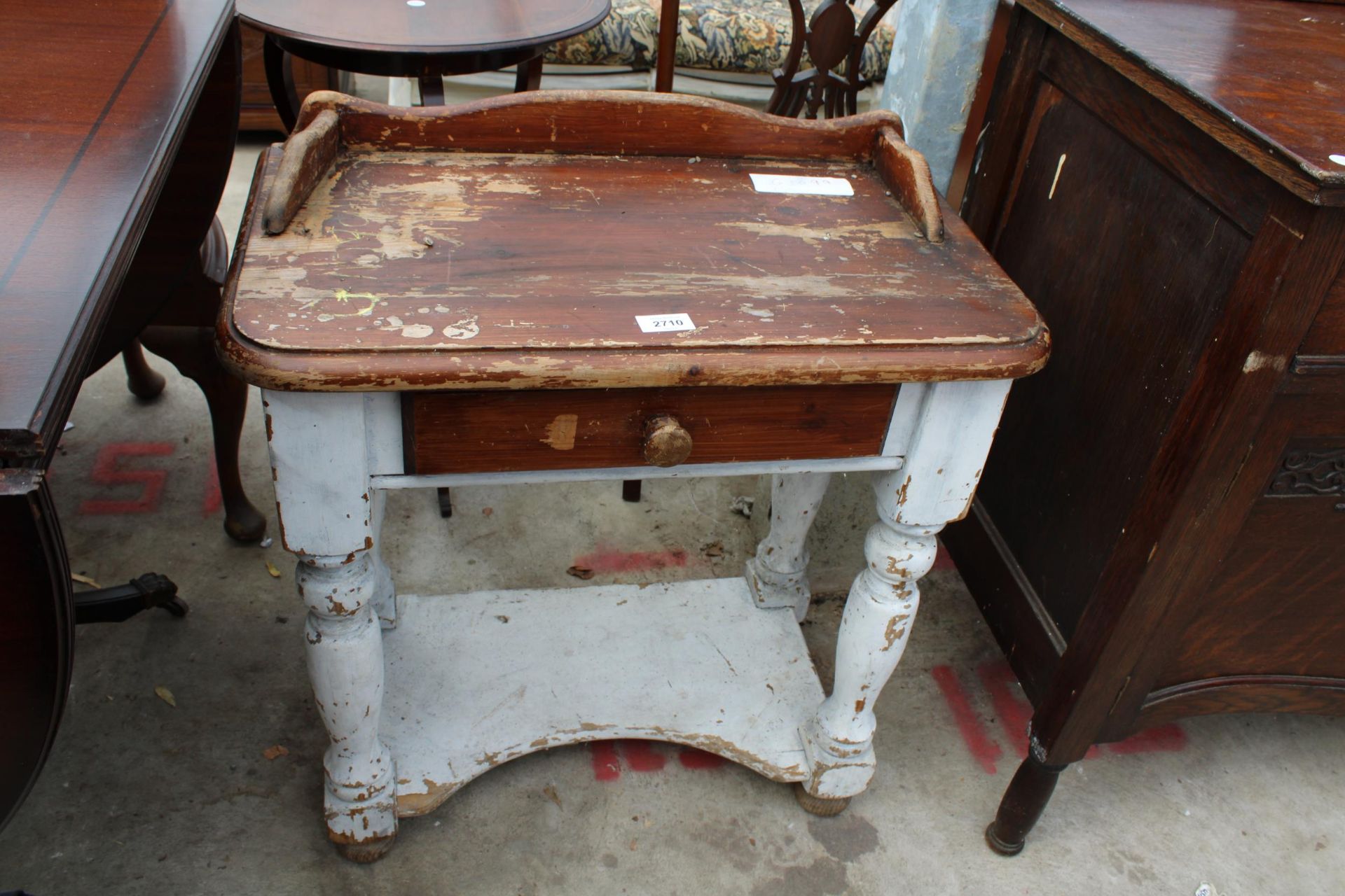 A MODERN PINE MINIATURE WASHSTAND WITH RAISED BACK ON TURNED LEGS 24" WIDE