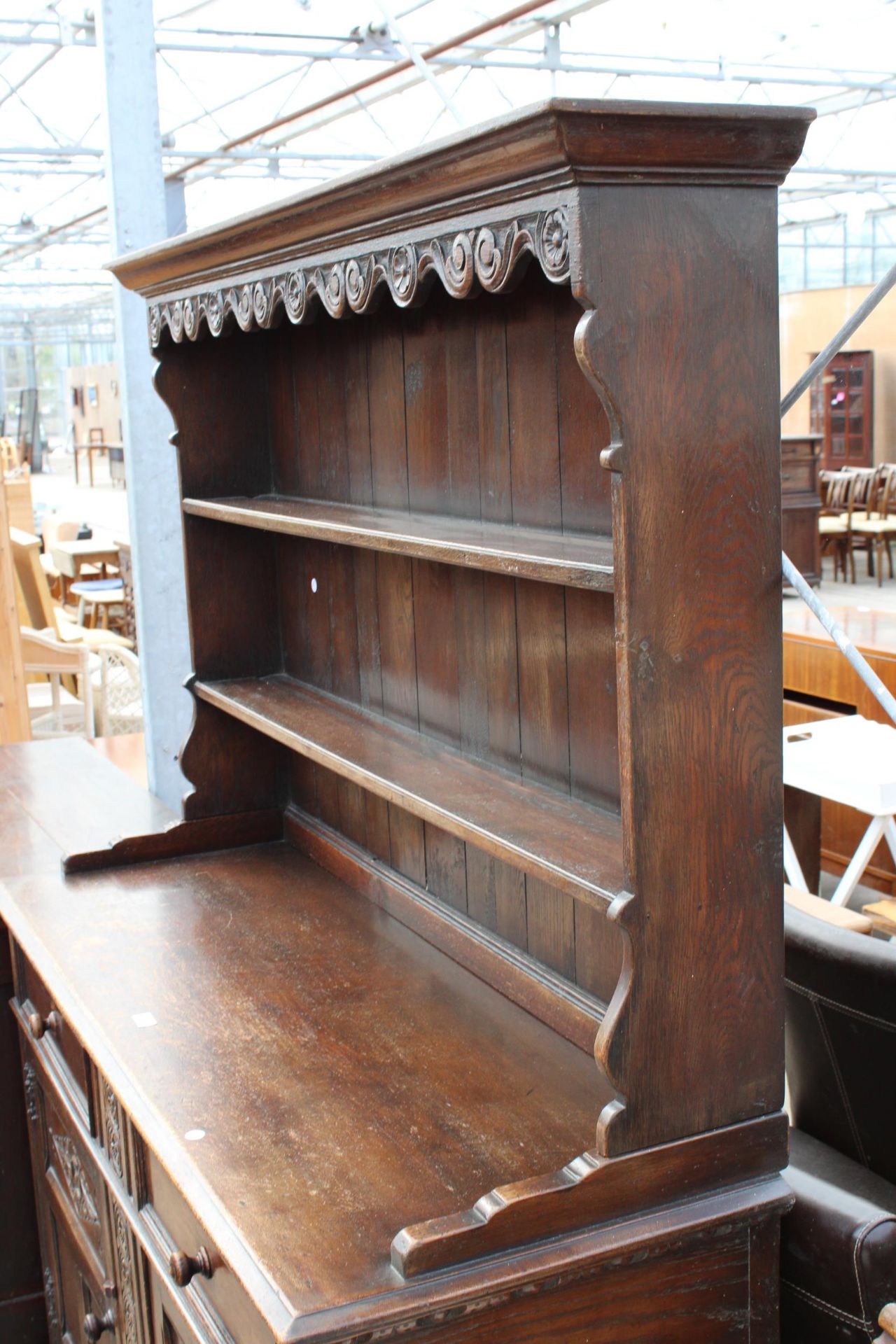 AN OAK JACOBEAN STYLE DRESSER WITH CARVED PANELS AND PLATE RACK, 56" WIDE - Image 2 of 5