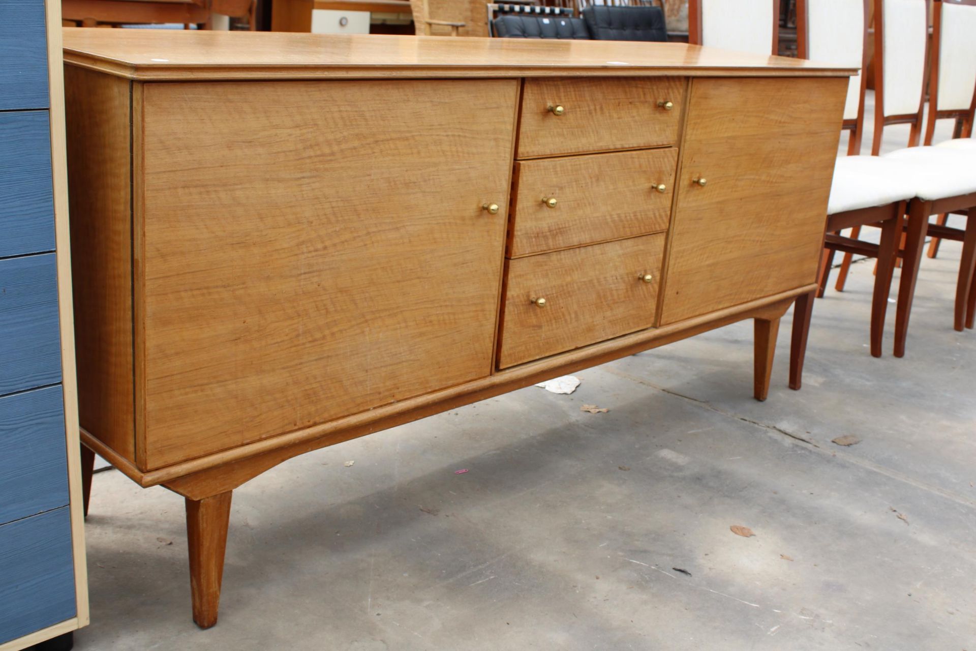 A RETRO HANDCRAFT ALFRED COX WALNUT SIDEBOARD ENCLOSING THREE DRAWERS AND TWO CUPBOARDS, 67" WIDE - Image 2 of 6