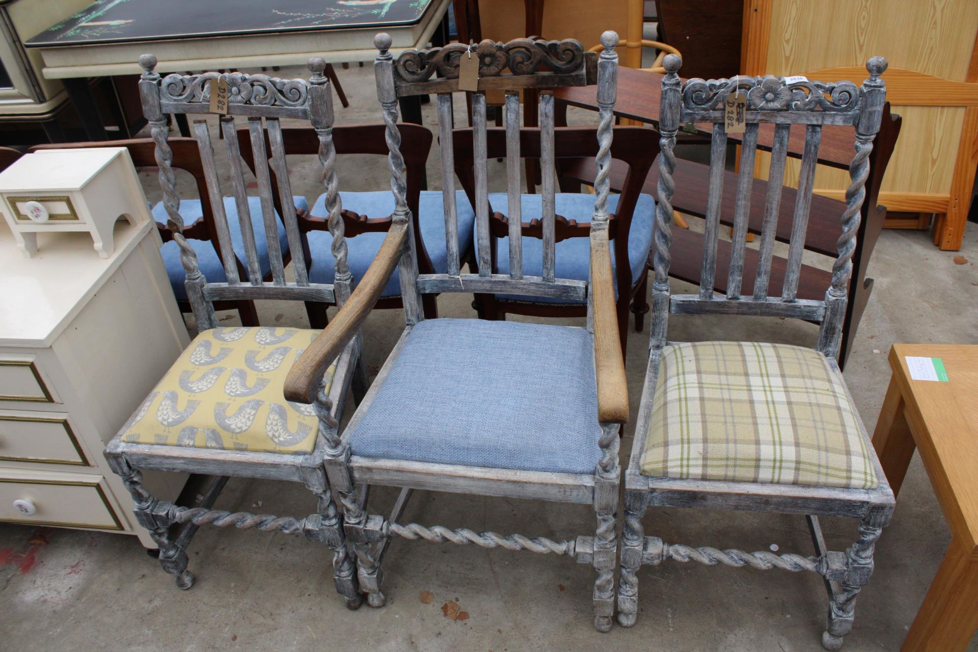 THREE EARLY 20TH CENTURY OAK SHABBY CHIC BARLEY-TWIST DINING CHAIRS, ONE BEING A CARVER