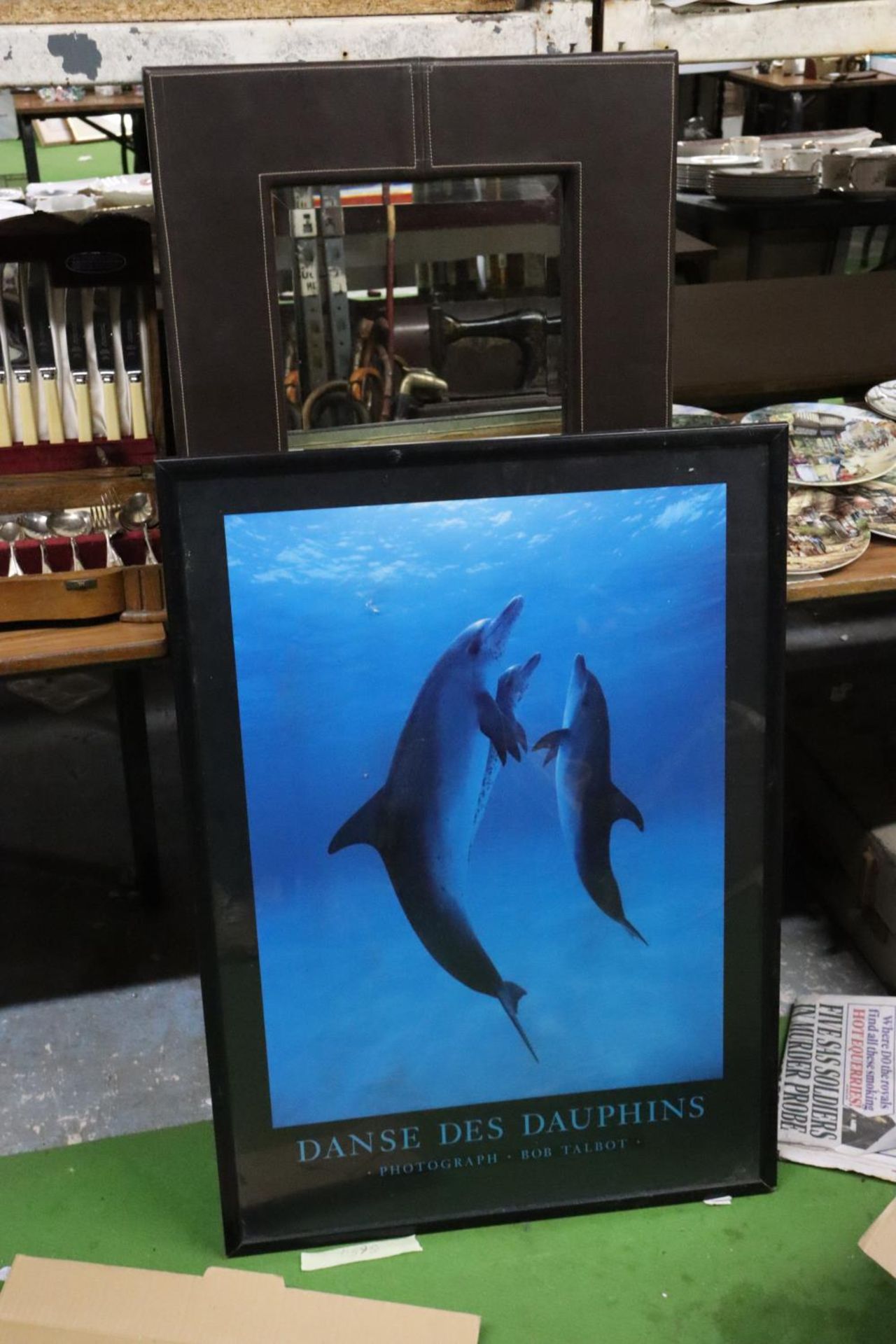 A LARGE MODERN MIRROR AND A FRAMED PRINT OF A DOLPHIN