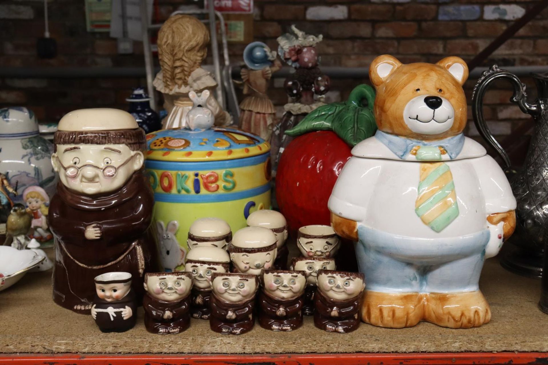 A COLLECTION OF ELEVEN 'WEISS' MONKS TO INCLUDE A STORAGE JAR, EGG CUPS AND CRUET SET, PLUS