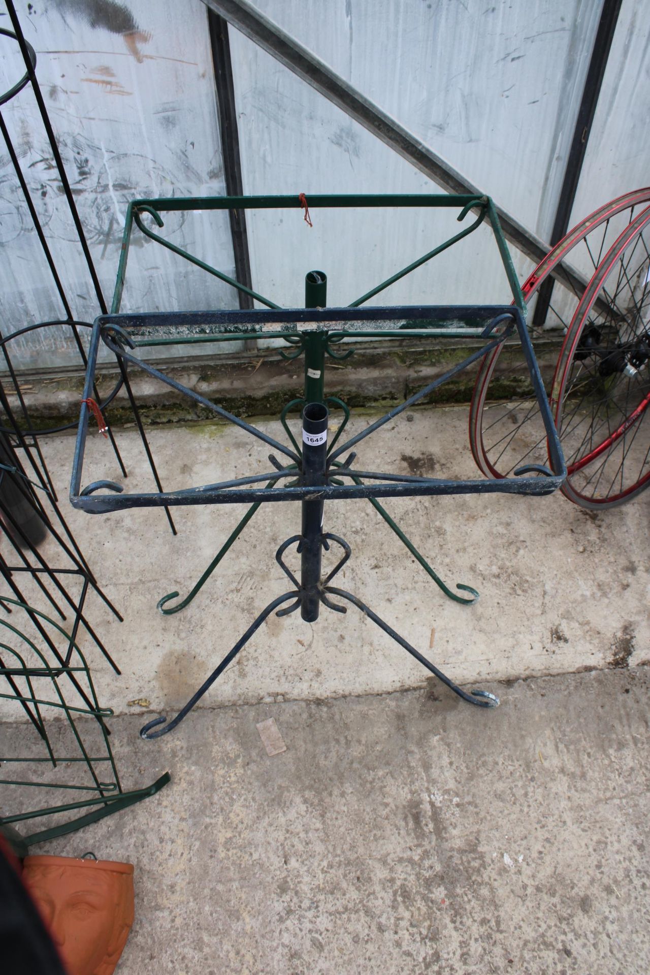 TWO METAL GARDEN SIDE TABLES WITH TRIPOD BASES, LACKING THE GLASS - Image 2 of 2