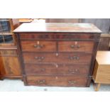 A 19TH CENTURY MAHOGANY CHEST OF TWO SHORT AND THREE LONG DRAWERS WITH SECRET FRIEZE DRAWER 52" WIDE