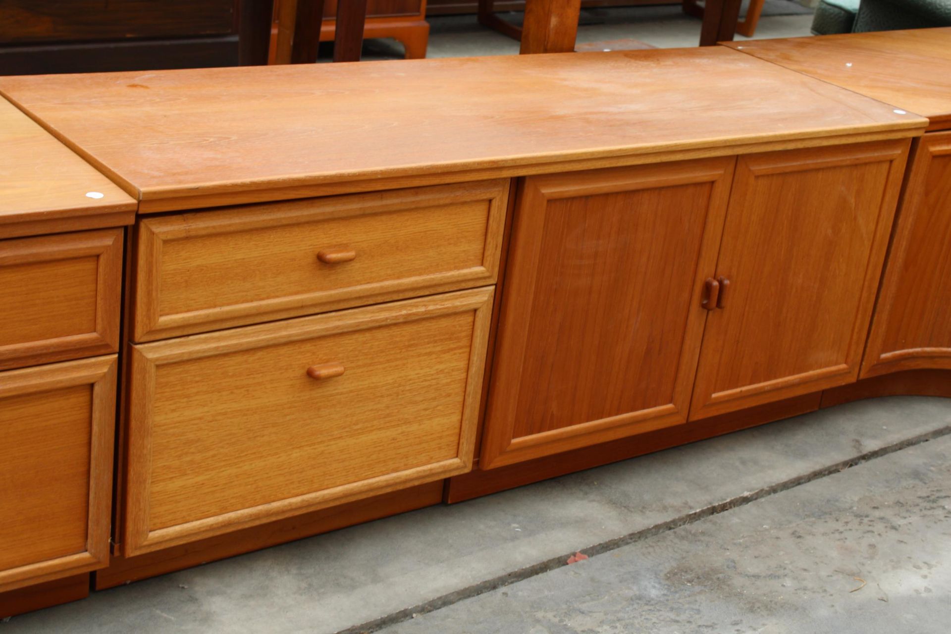 A RANGE OF FOUR RETRO LOW UNITS ENCLOSING CUPBOARDS AND DRAWERS - Image 3 of 4