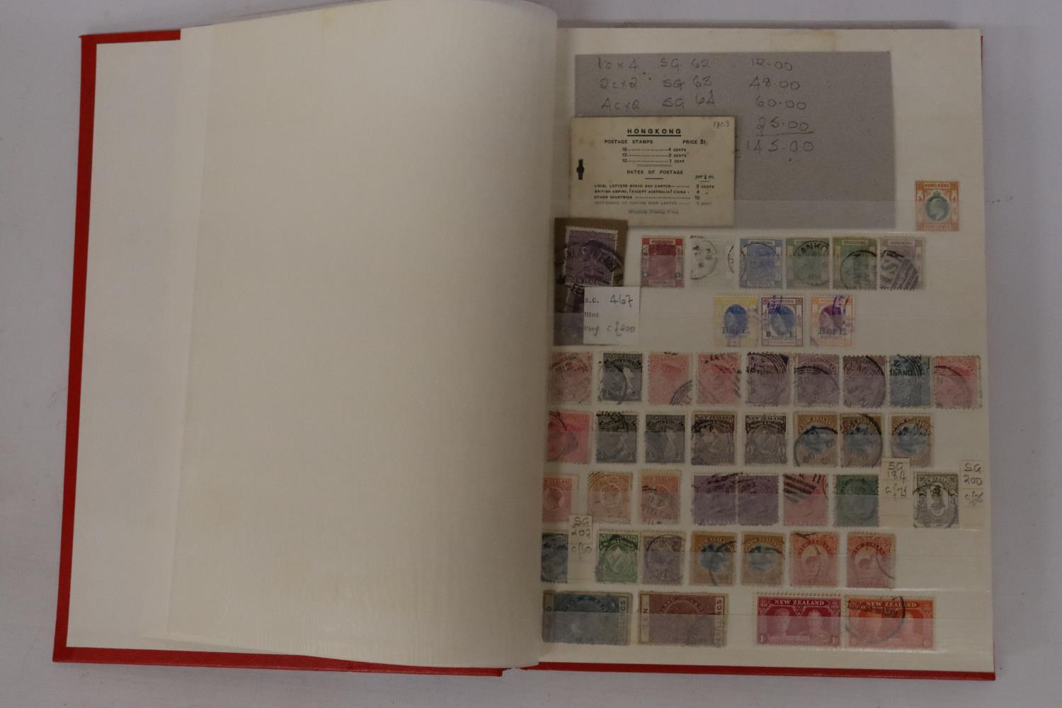 THE RED COMPASS STOCKBOOK HOUSING AN ECLECTIC COLLECTION OF GB AND BRITISH COMMONWEALTH MINT AND