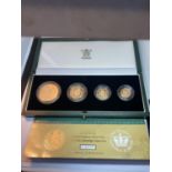 A 2002 ROYAL MINT GOLD PROOF FOUR COIN COLLECTION CELEBRATING QUEEN ELIZABETH II GOLDEN JUBILEE TO