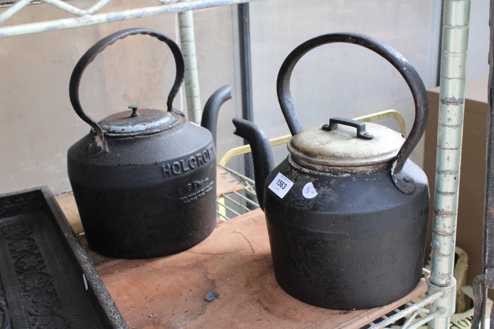 TWO VINTAGE CAST IRON KETTLES