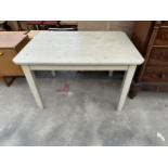 A PAINTED PINE KITCHEN TABLE WITH CANTED CORNERS, 50" X 35"