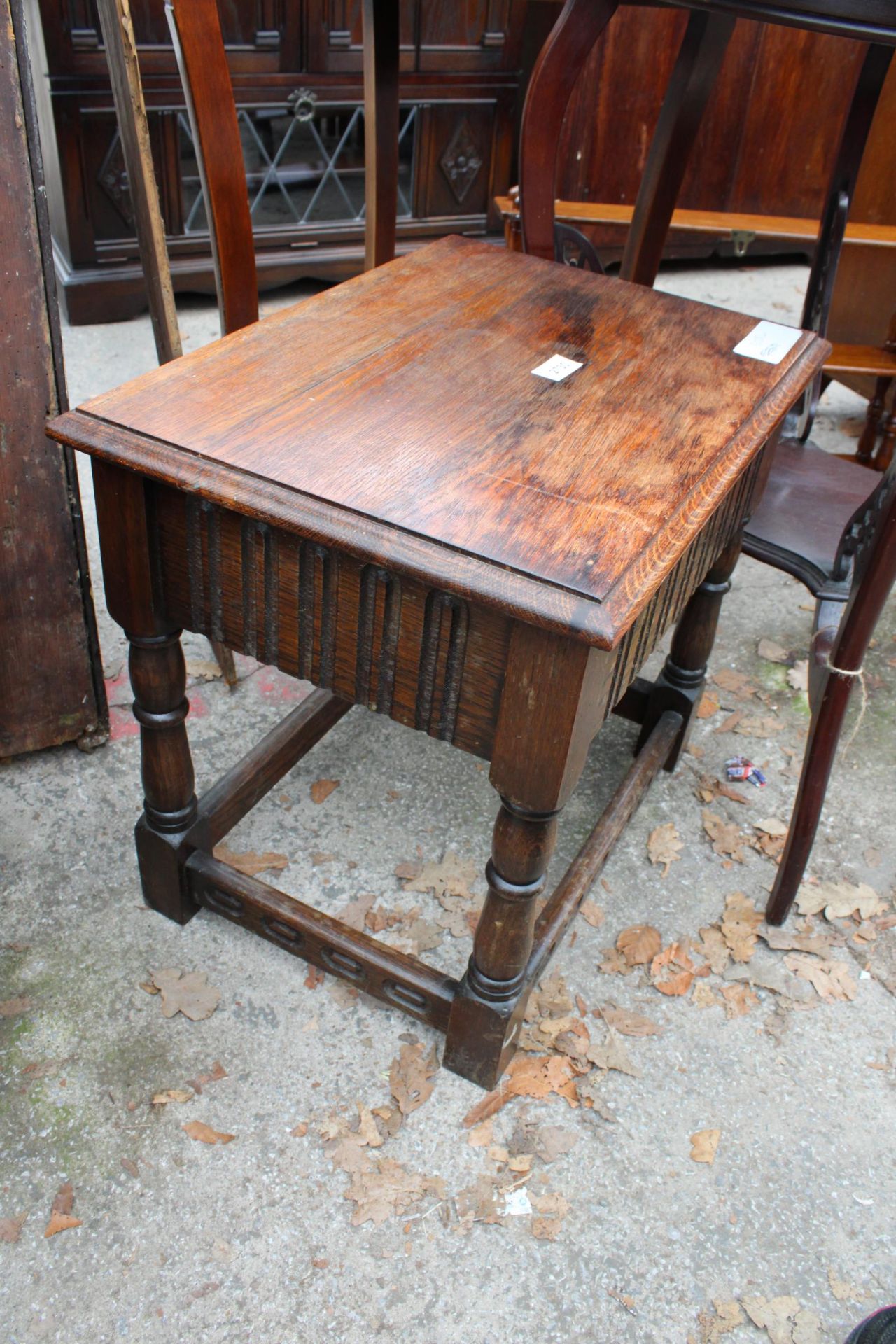AN OAK JACOBEAN STYLE OAK STOOL WITH DRAWER - Image 2 of 3
